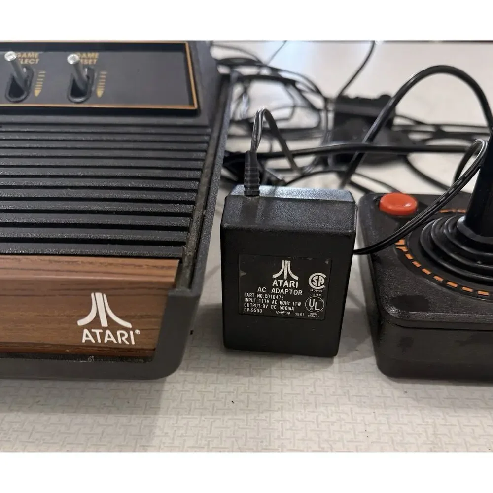 Atari 2600 Black Video Game Console Bundle with Pac-Man Game